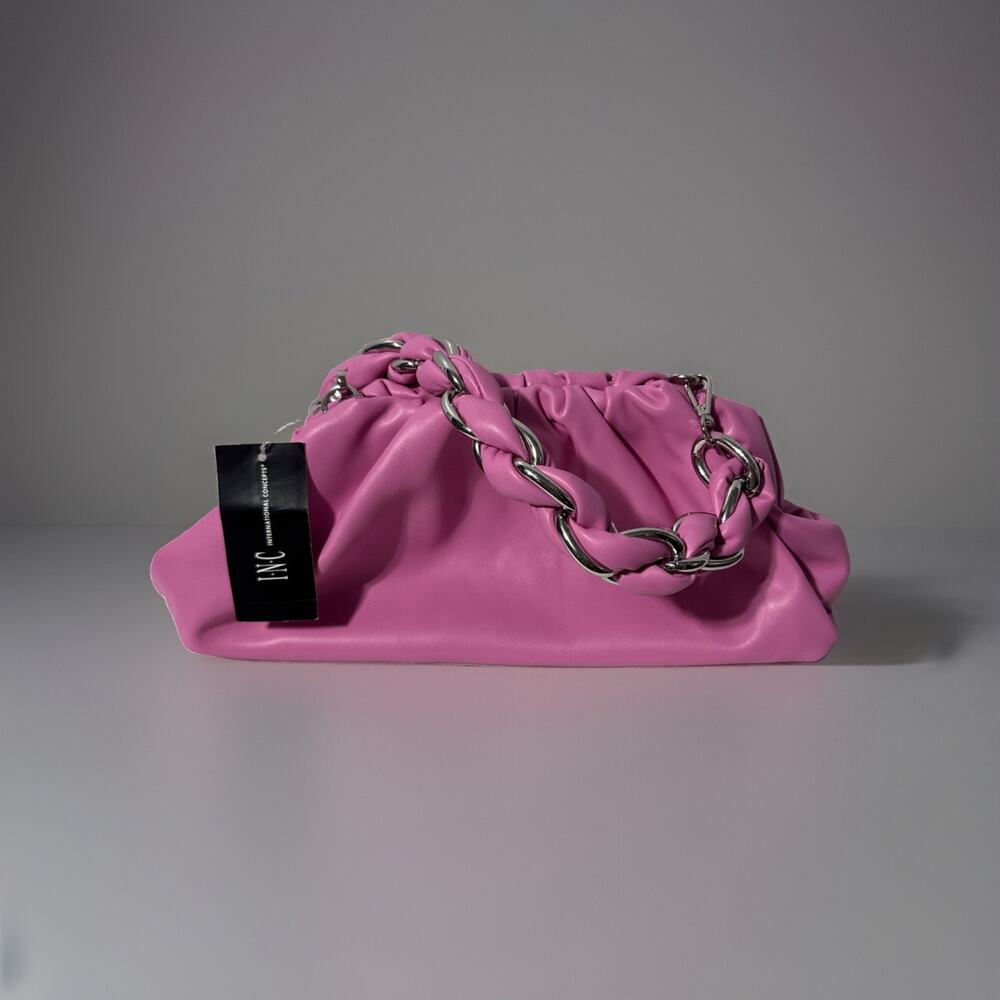 INC International Concepts pink slouchy pouch bag with silver chain strap.